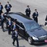 12 мъже в черно с джогинг по колата на Ким Чен Ун