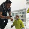 Коцето и синът му се радват на първия сняг