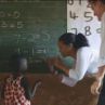 Риана преподава математика на деца в Малави