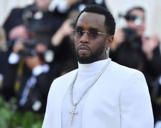 P. Diddy стана помощник на свещеника в затвора